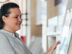 Person using interactive screen