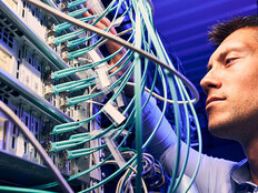 Engineer testing cables