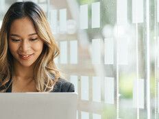 Person holding laptop