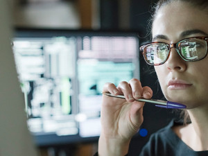 Programmer working on computer