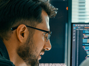 Person looking at code/data