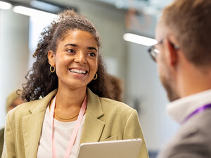 People talking at a conference