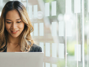Person holding laptop