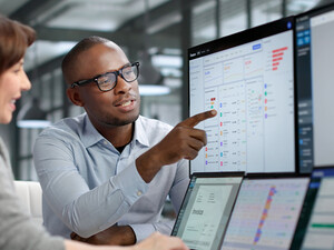 Coworkers reviewing data