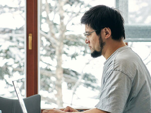 Person using computer remotely