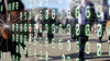 Streams of binary code being transmitted from the phones and tablets of people walking 