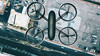 Drone hoovers over city in high angle view