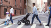 Two families with daughters crossing road