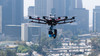 Drone inspecting city buildings 