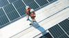 Solar panel team surveying