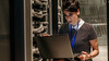 Person working in a server room