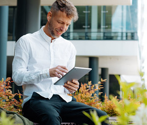 Person using tablet outside of office