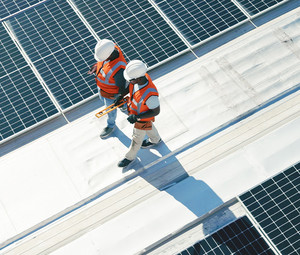 Solar panel team surveying