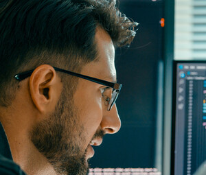 Person looking at code/data