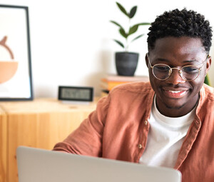 Person using laptop at home